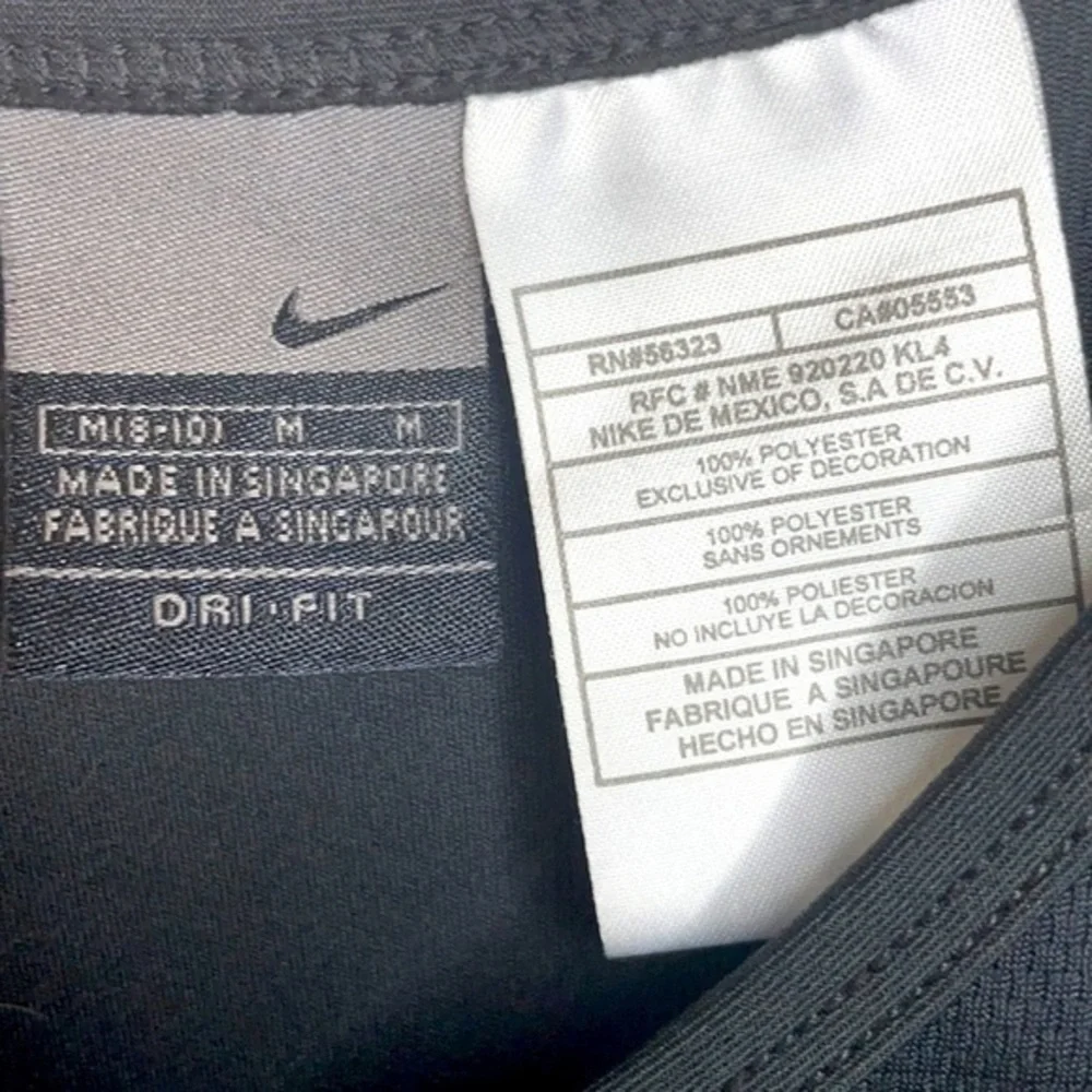 NIKE | Kids Size 8-10 ( Girl) Black Nike Swoosh V-Neck Shirt